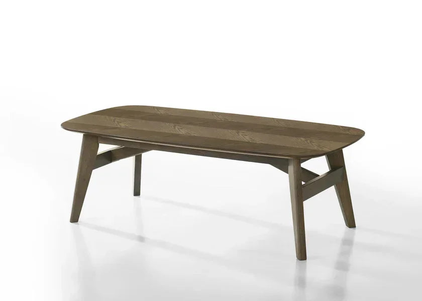 Rectangular wooden dining table with angled legs on a white background