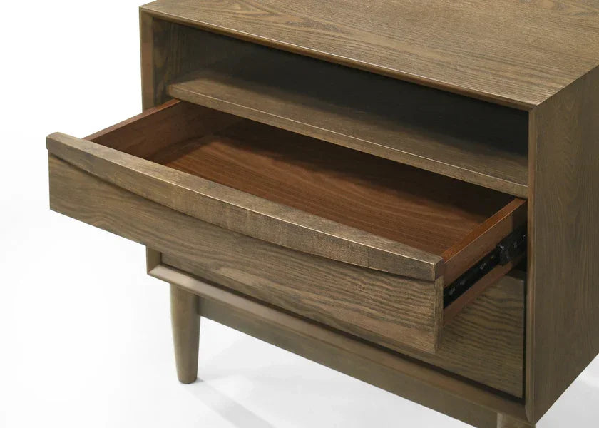 Wooden bedside table with open drawer and shelf, angled view shows leg detail