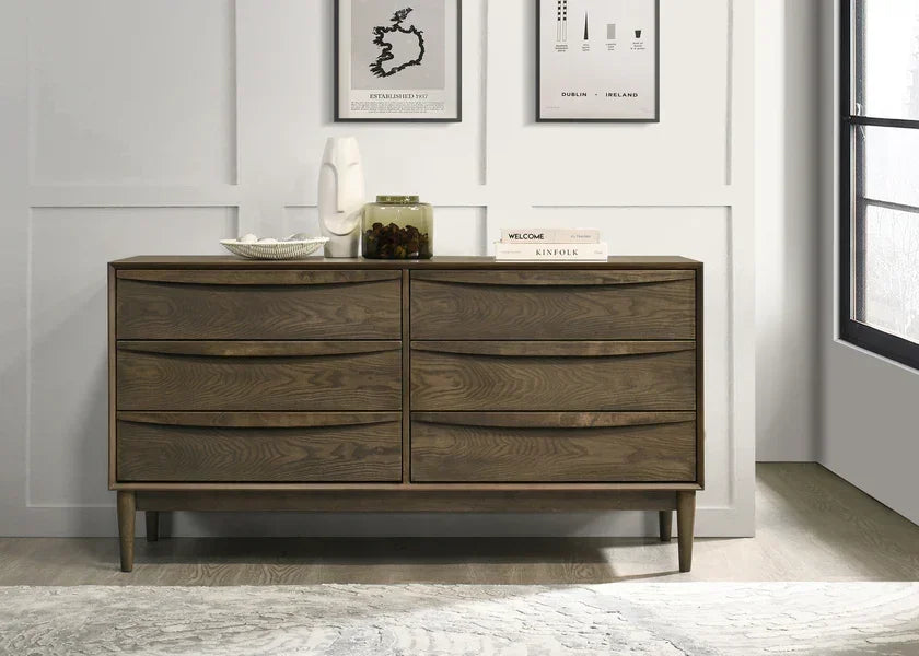 Six drawer wooden sideboard with a mid-century design in a modern room setting