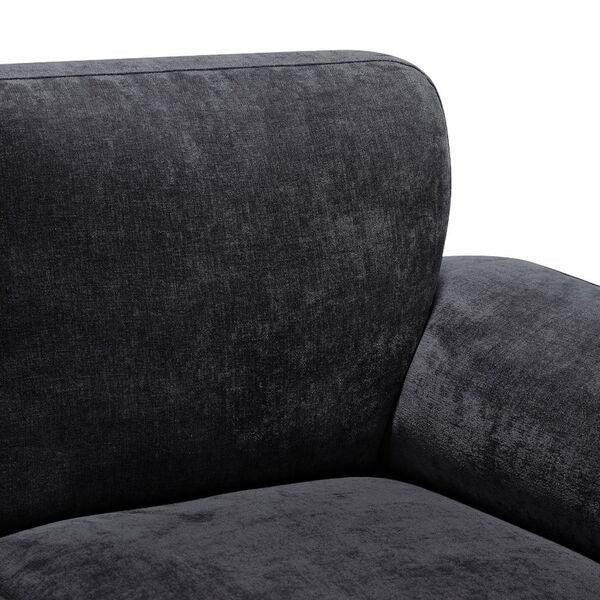 Dark grey fabric sofa close-up showing cushioned backrest and armrest detail