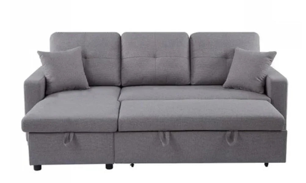 Grey fabric corner sofa bed with storage and two matching cushions front view