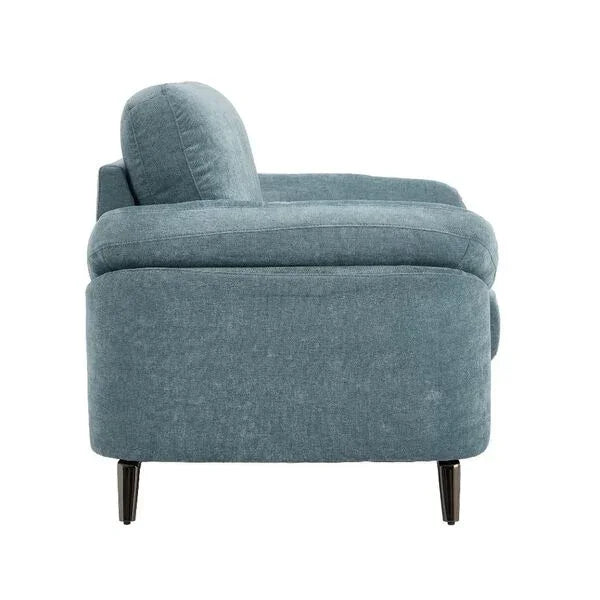 Side view of blue fabric sofa with plush cushions and black legs