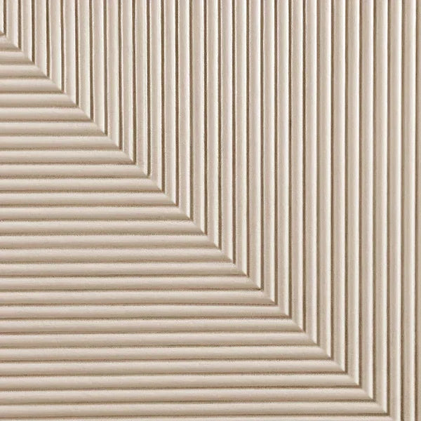 Beige textured furniture panel with vertical and diagonal grooves