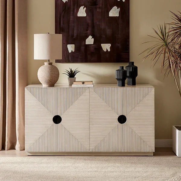 Modern sideboard with geometric pattern, table lamp, decor vases and abstract wall art