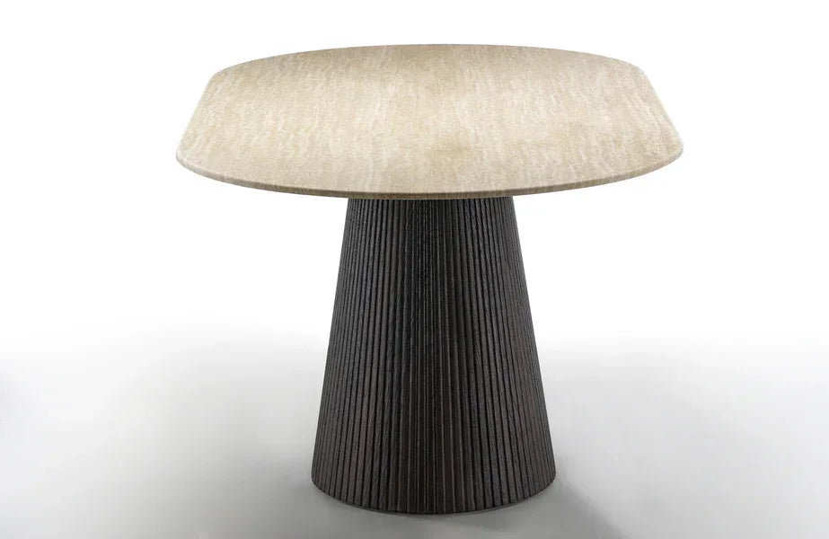 Square stone dining table with beige top and black fluted pedestal base
