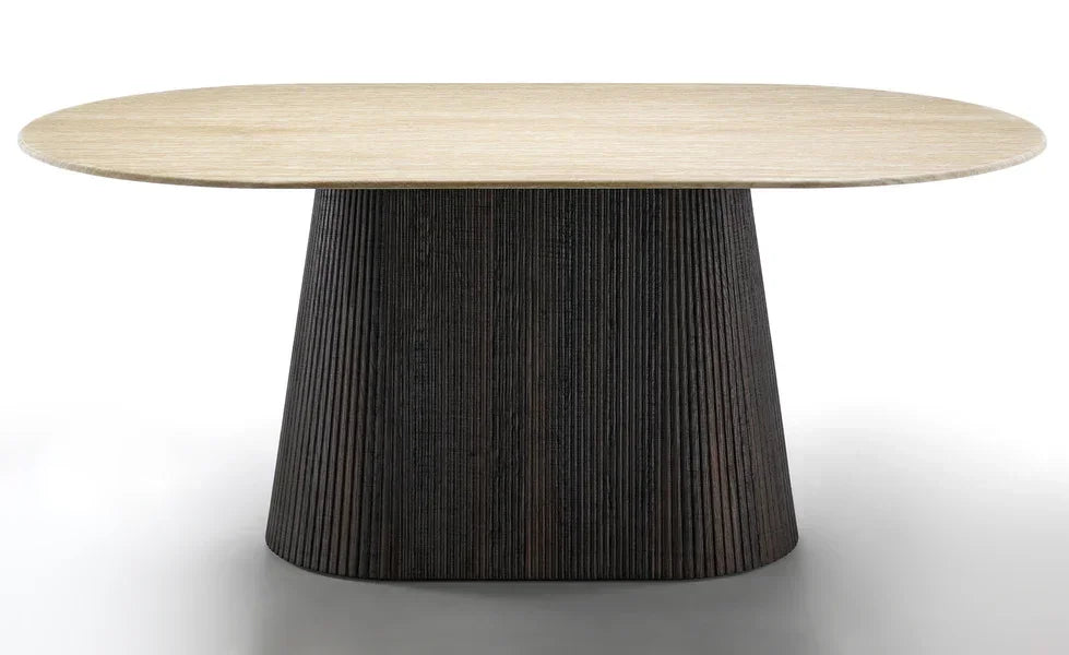 Oval wooden dining table with light wood top and dark textured pedestal base
