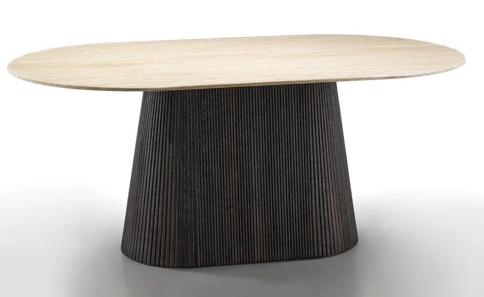 Oval dining table with light wood top and dark ribbed pedestal base