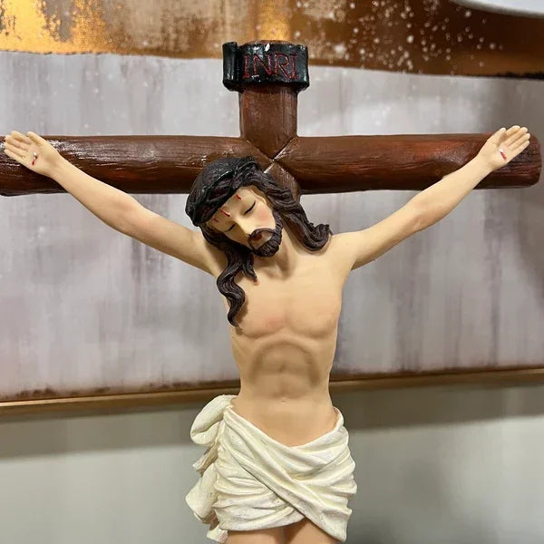 Crucifix figure with detailed wood cross and cloth drape, wall-mounted religious decor
