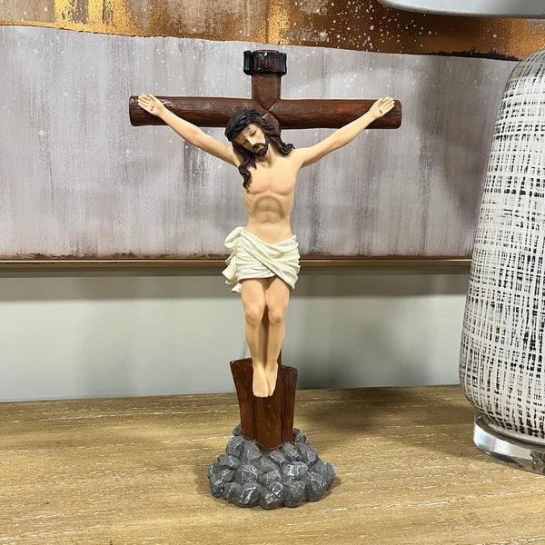 Resin crucifix statue with realistic Jesus figure on wooden base for home decor display