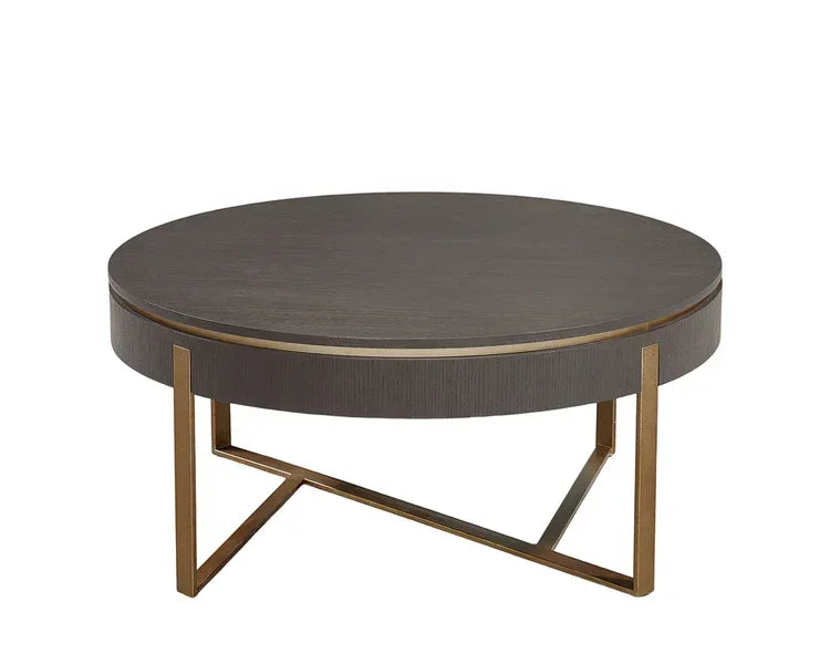 Round dark wood coffee table with gold metal frame and modern geometric base