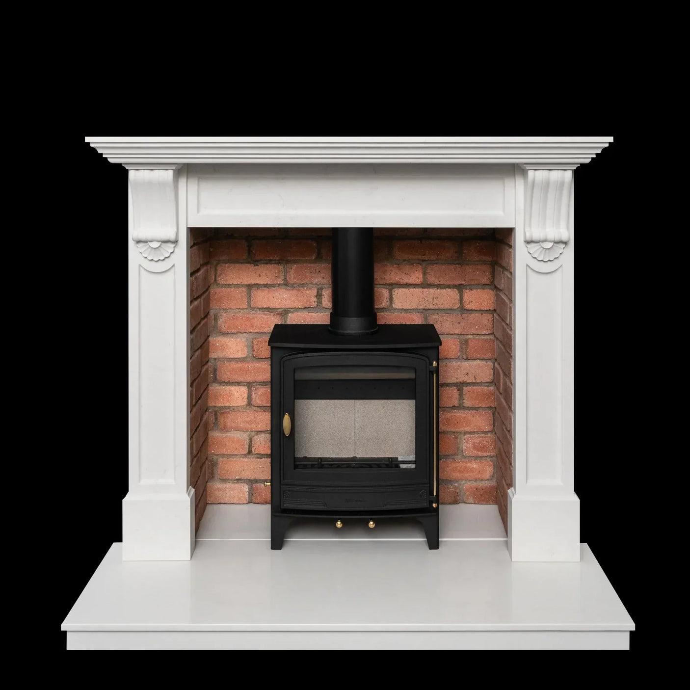 Black wood burning stove with glass door set in white fireplace and red brick surround
