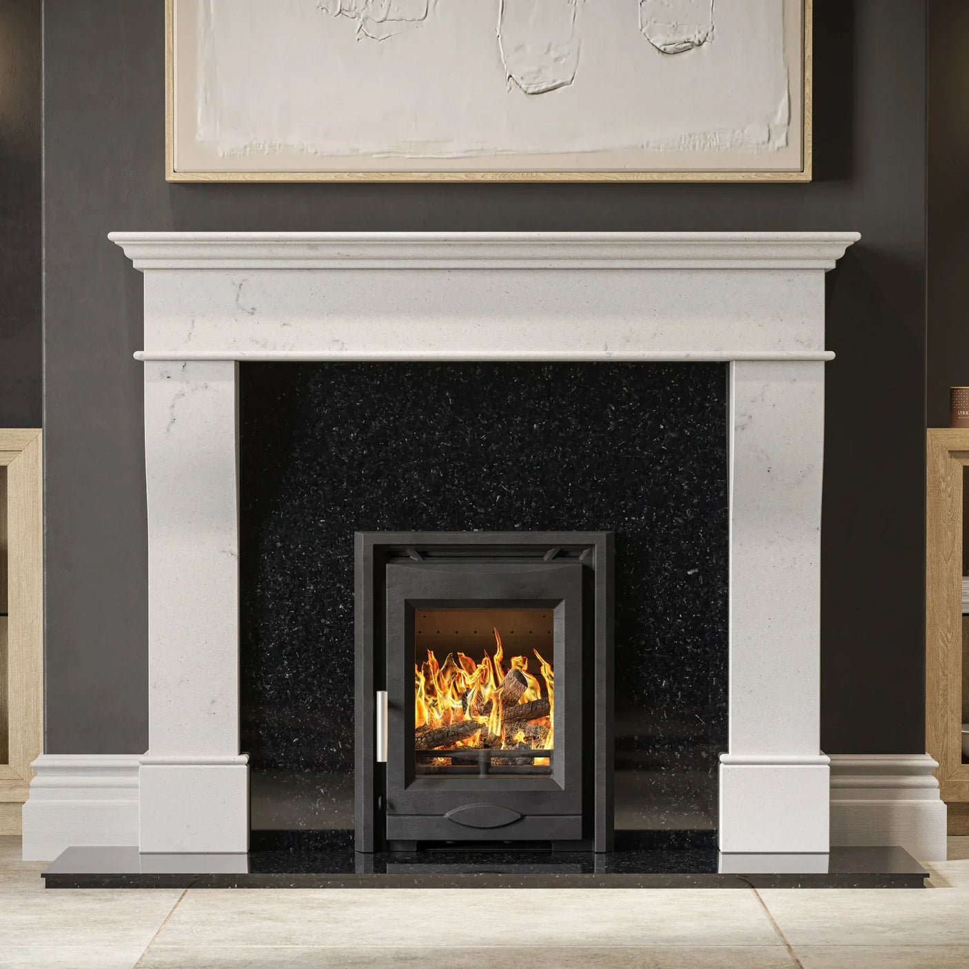 White marble fireplace surround with black insert and modern wood burning stove