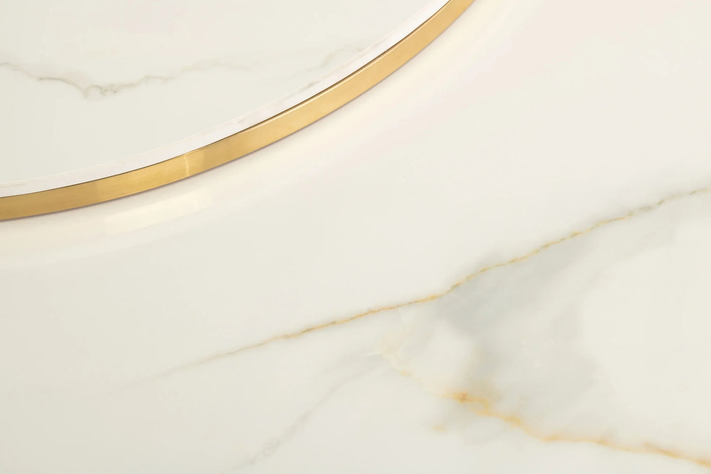 Close up of marble coffee table with gold trim detailing