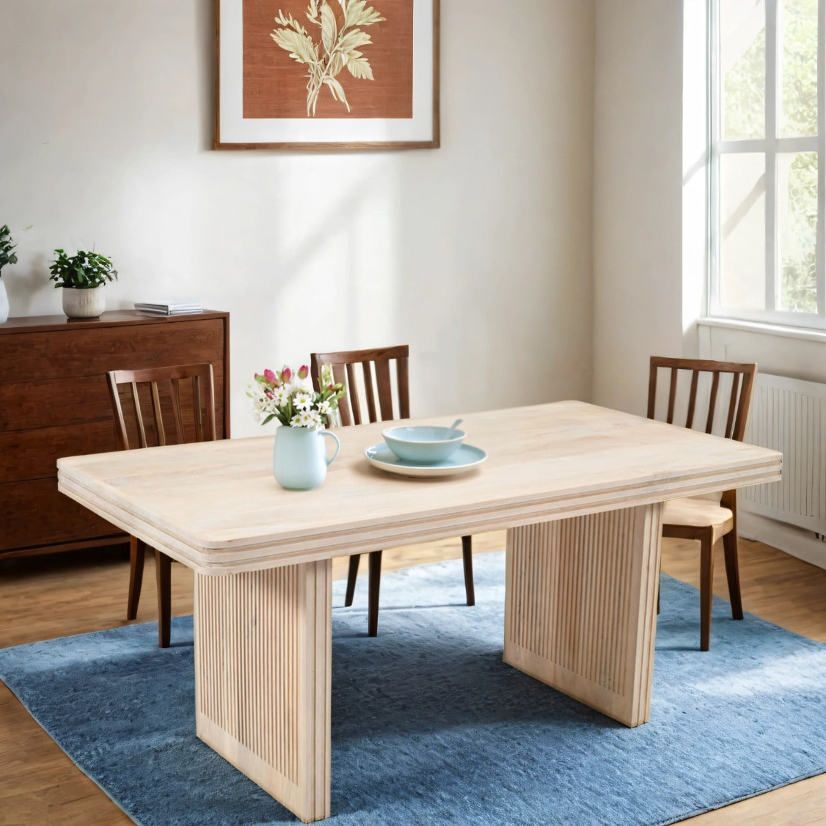 Hudson side table made of carved mango wood in a stylish setting