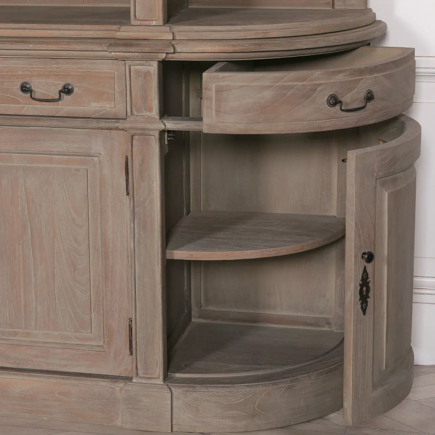 Rustic wooden sideboard with open drawer and curved cabinet shelves