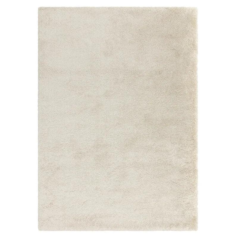 Rectangular cream shaggy rug with soft texture and plain design