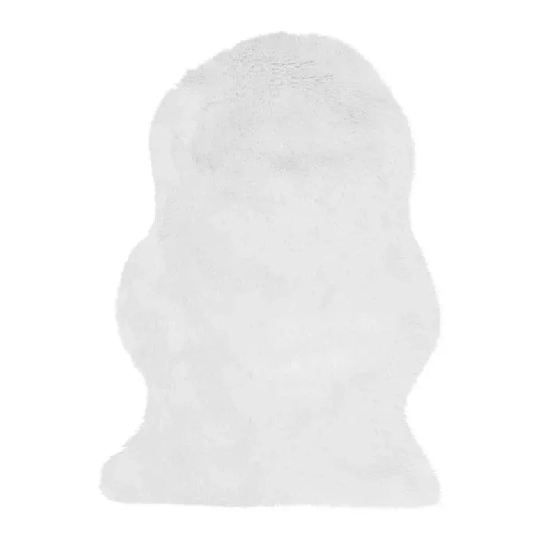 White faux fur rug with soft pile and irregular edges