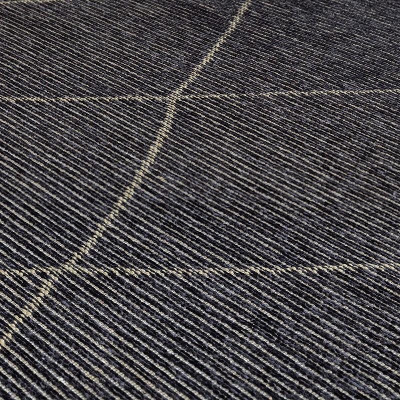 Grey striped rug with cream criss-cross lines and textured wool surface