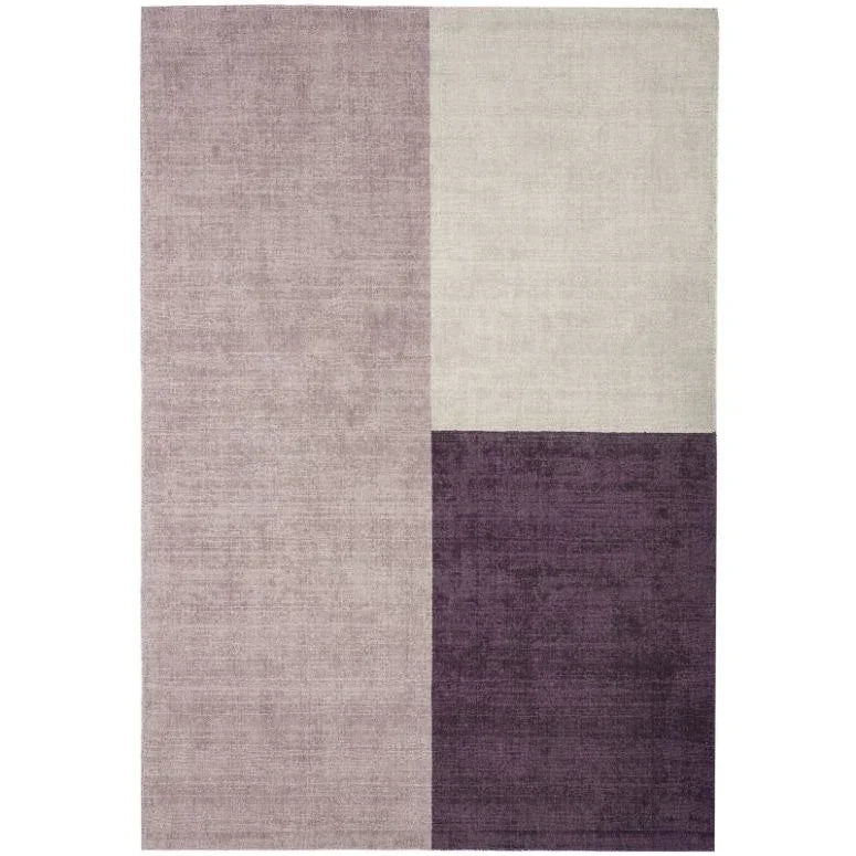 Modern area rug with geometric blocks in purple, lilac and beige tones