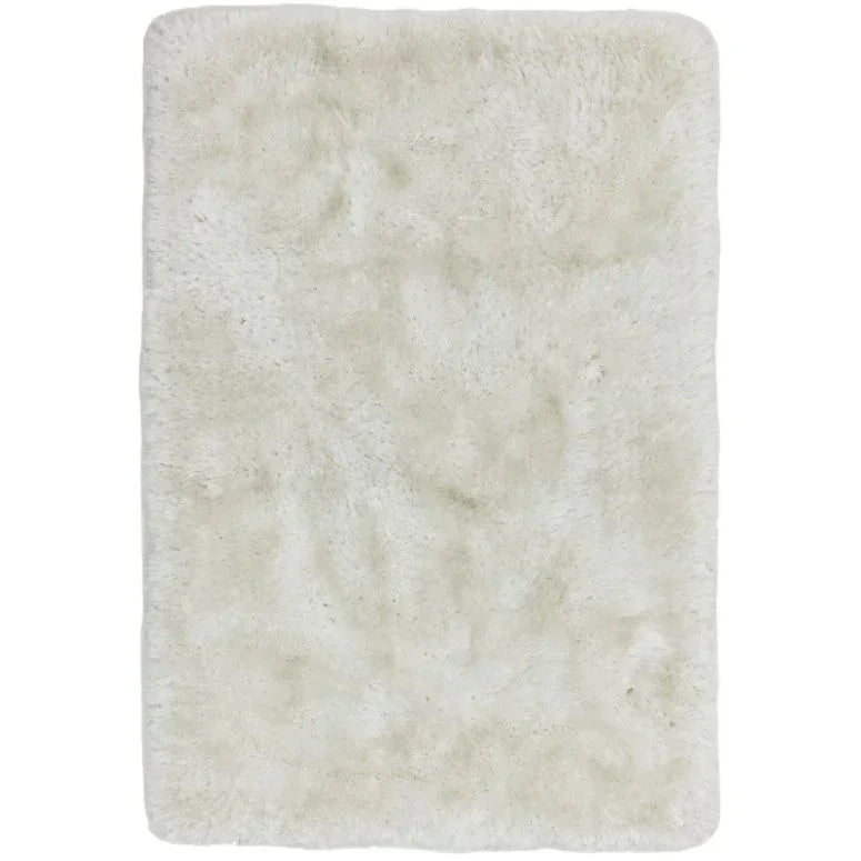 Rectangle cream fluffy rug with soft texture and high pile
