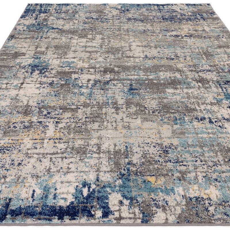 Modern area rug with abstract blue, grey and beige pattern