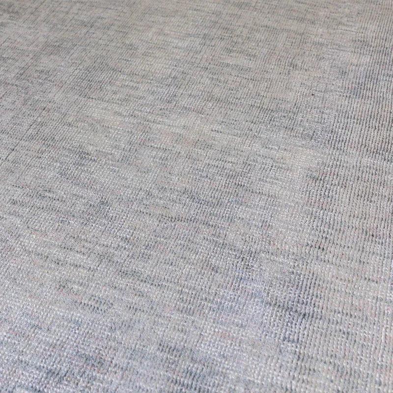Close-up of textured light grey fabric upholstery for sofa or chair