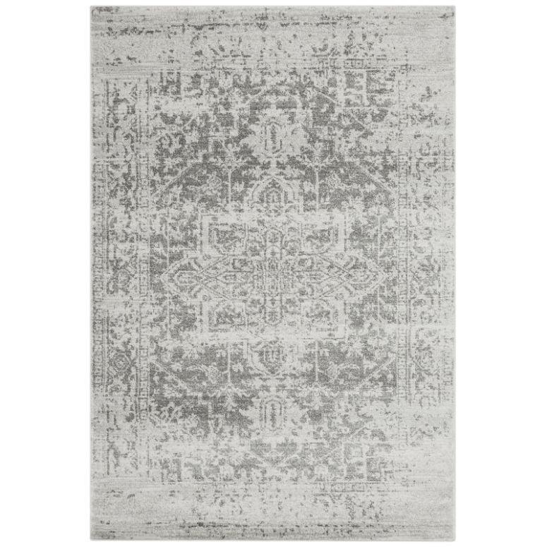 Grey patterned area rug with distressed medallion design and rectangular shape