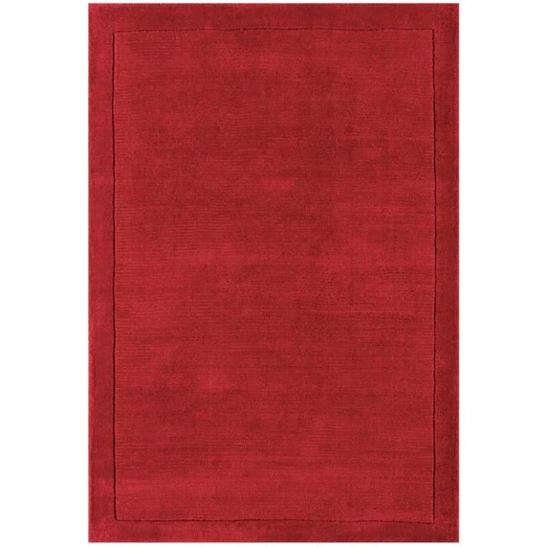 Rectangular red area rug with tonal border, plain design and soft texture for living room
