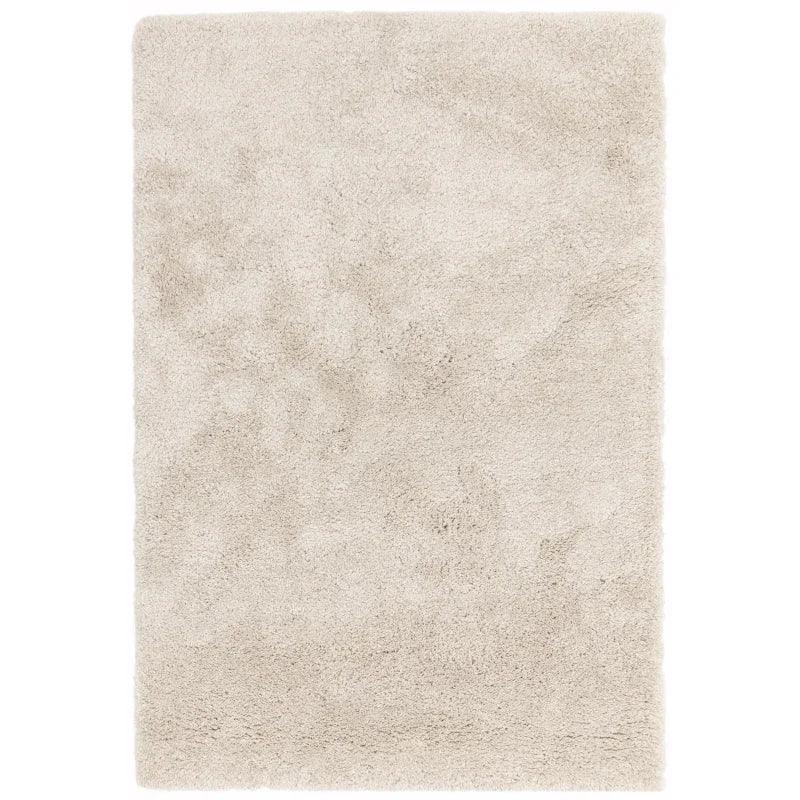 Cream shaggy rug with thick pile texture, rectangular shape, overhead view