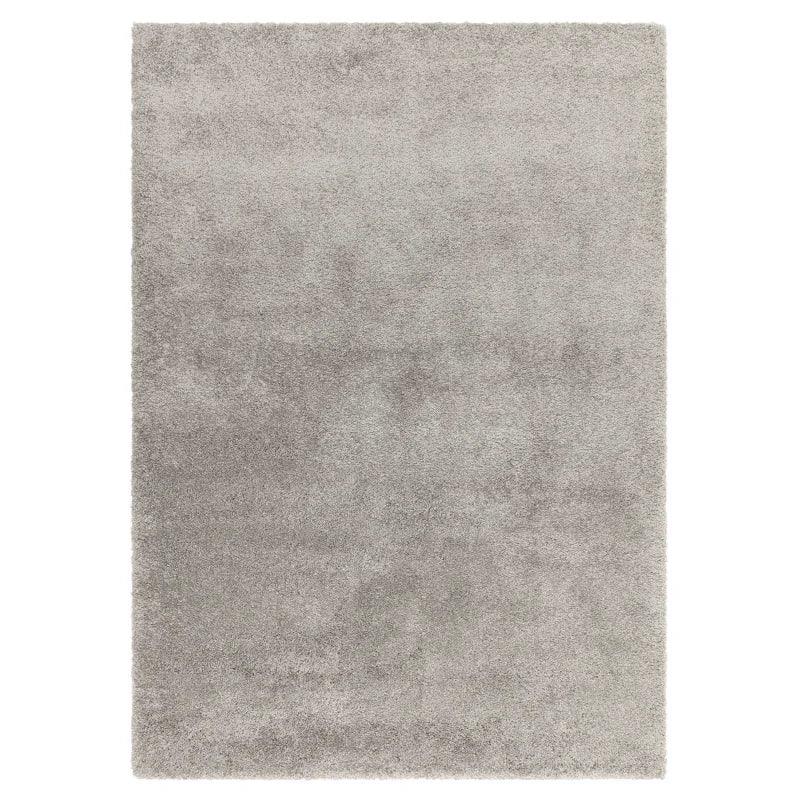 Light grey shaggy area rug with soft pile and rectangular shape