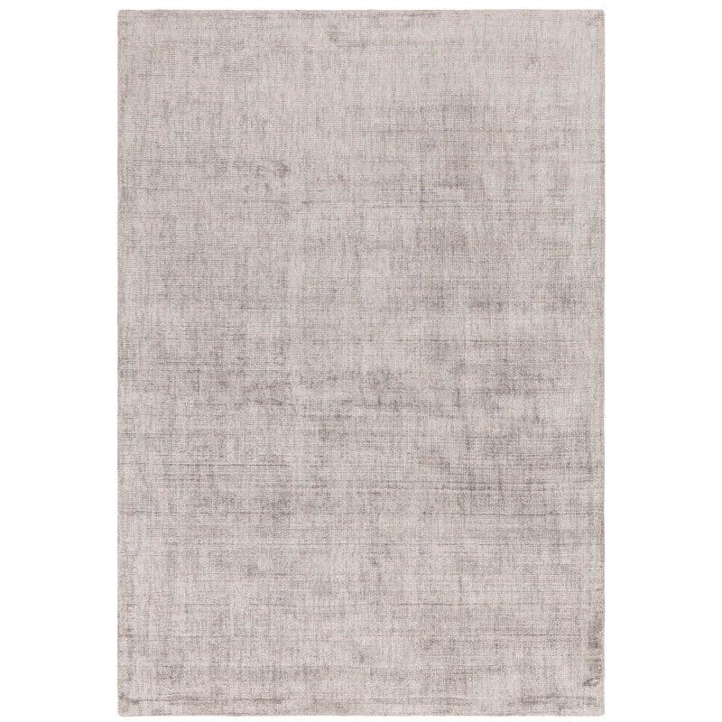 Large rectangular light grey area rug with subtle texture and short pile