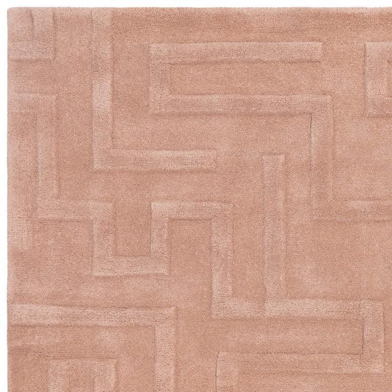 Light brown geometric pattern rug with raised textured lines