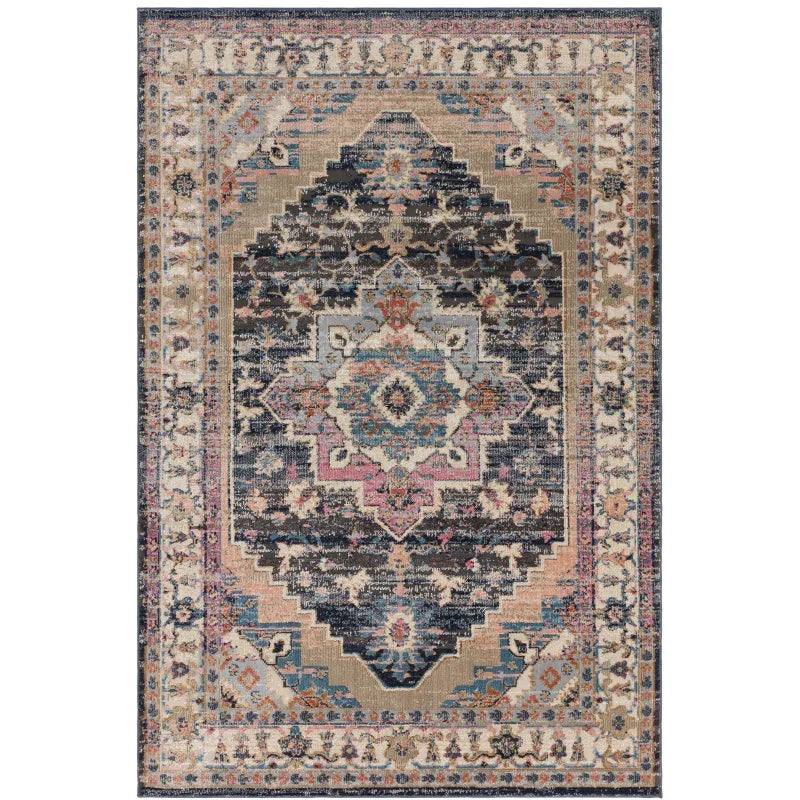 Traditional patterned area rug with navy, beige, and pink tones, central medallion design