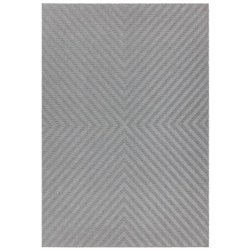 Grey chevron patterned rug with subtle texture and geometric design