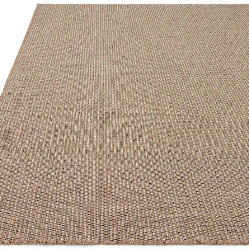 Beige woven area rug with subtle striped pattern and textured surface