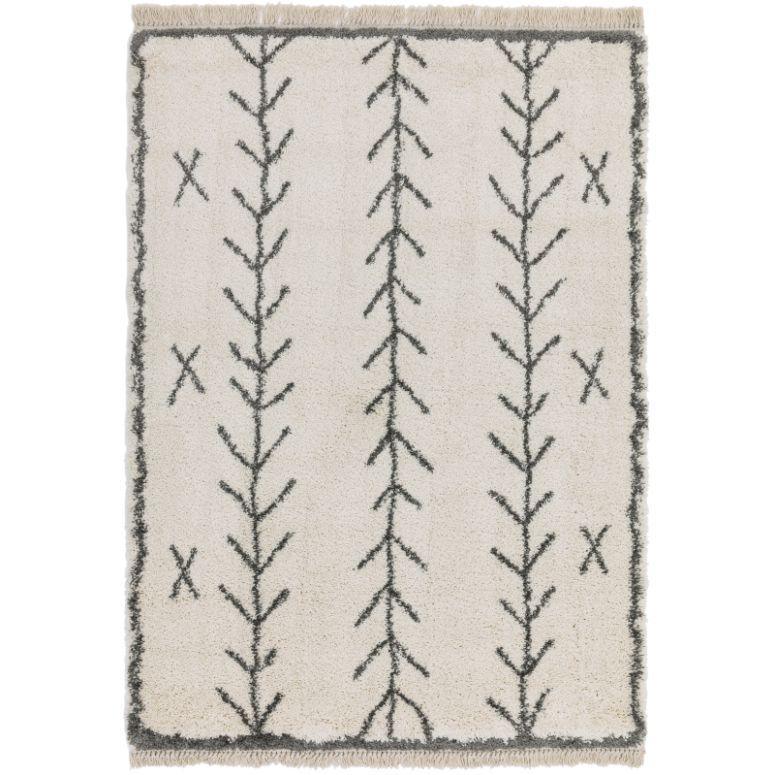 Cream rug with black geometric line pattern and fringed edges
