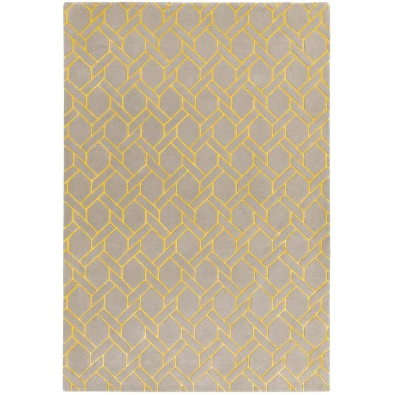Grey area rug with yellow geometric pattern and rectangular shape