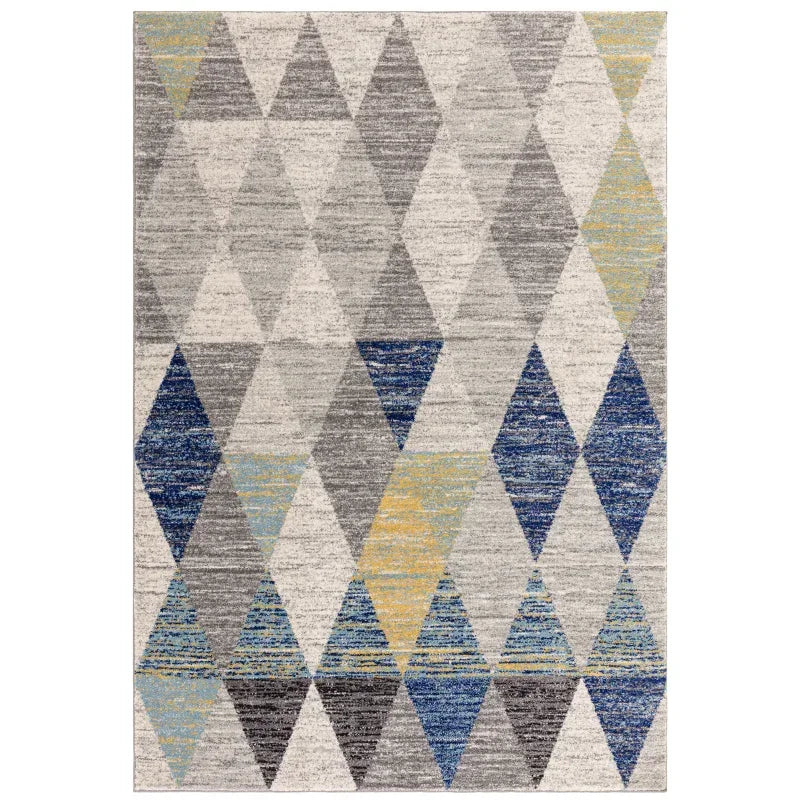 Modern area rug with blue, yellow and grey geometric diamond pattern
