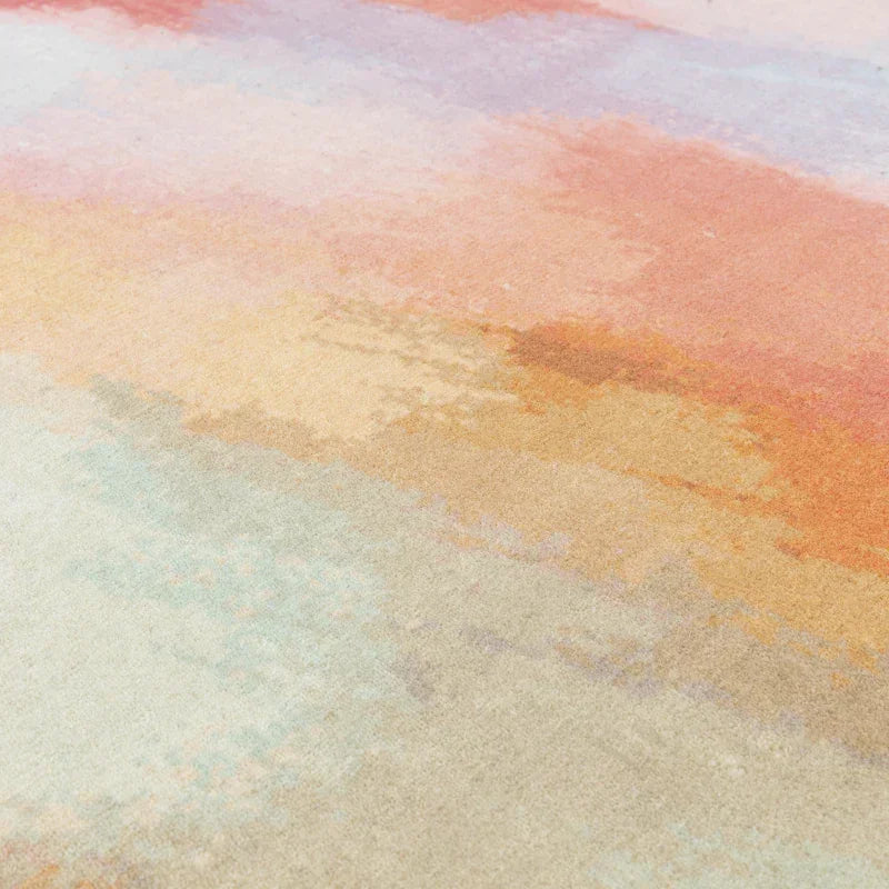 Abstract multicolour rug with soft pastel orange, beige, and light blue gradient design