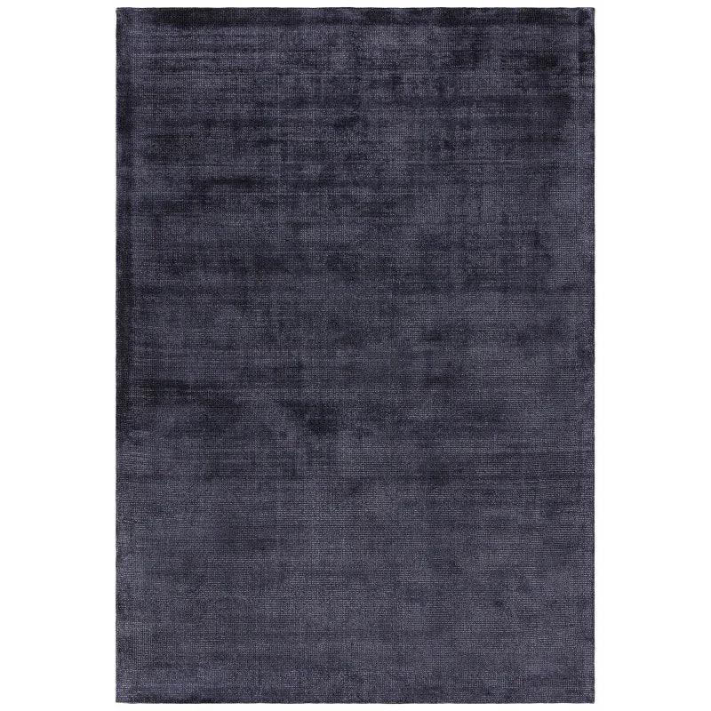 Rectangular charcoal rug with soft textured finish and subtle sheen