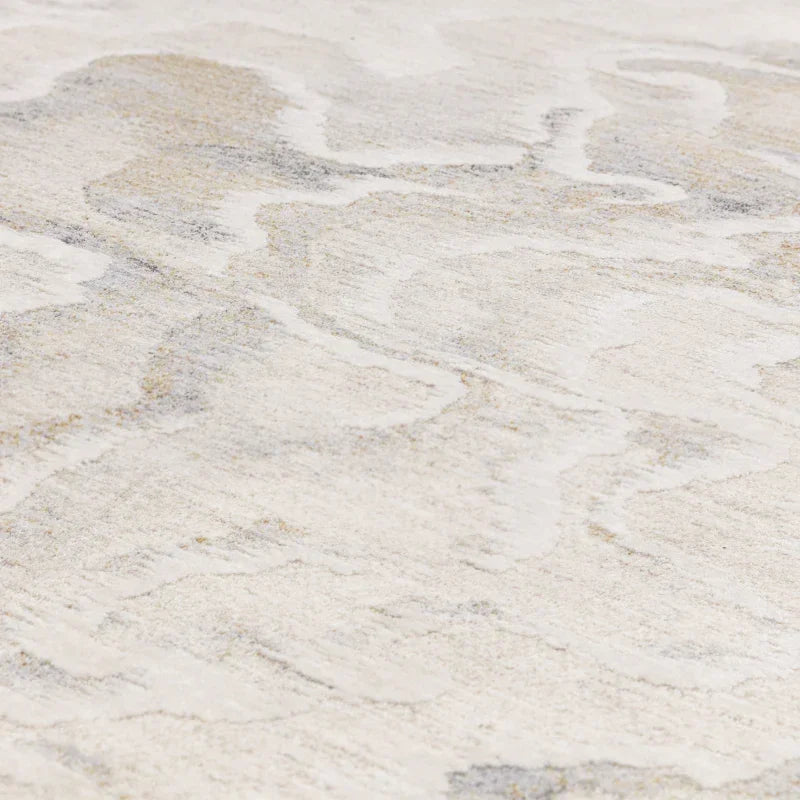 Closeup of abstract beige and grey rug texture with soft pile