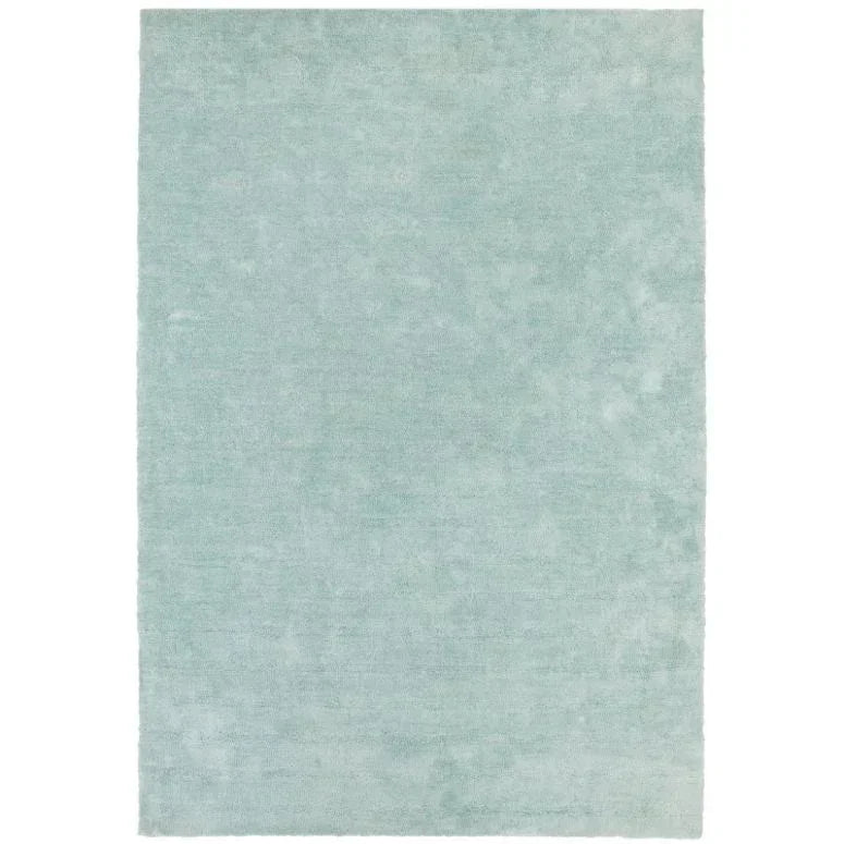 Light blue area rug with soft, even texture and rectangular shape