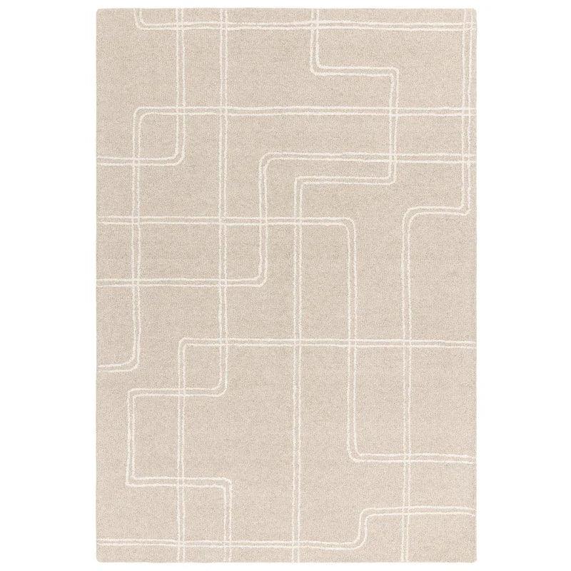 Beige area rug with white geometric line pattern and textured wool surface