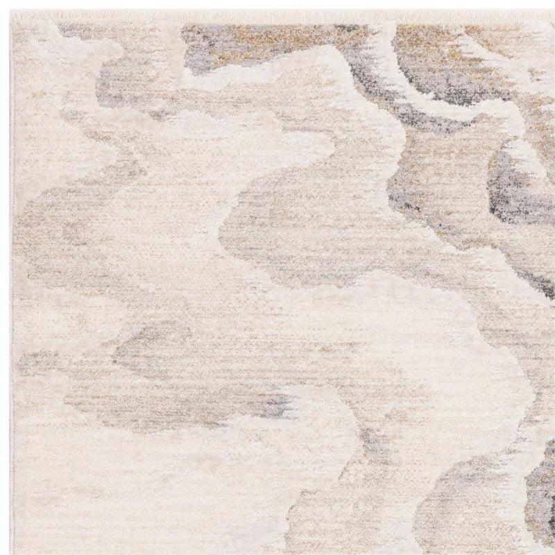 Neutral abstract area rug with soft beige and grey cloud pattern