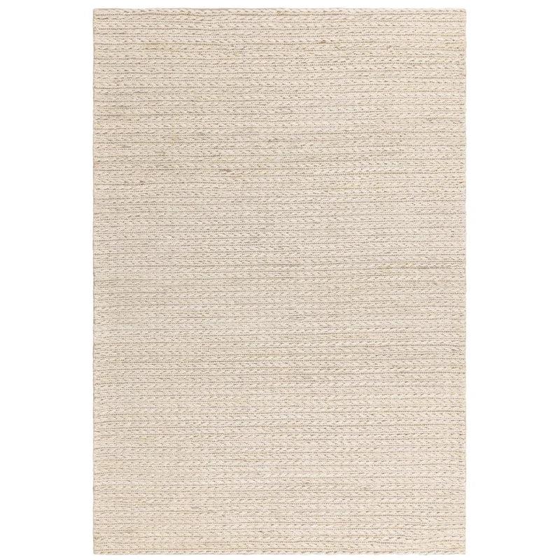 beige woven area rug with textured fibre detail and rectangular shape