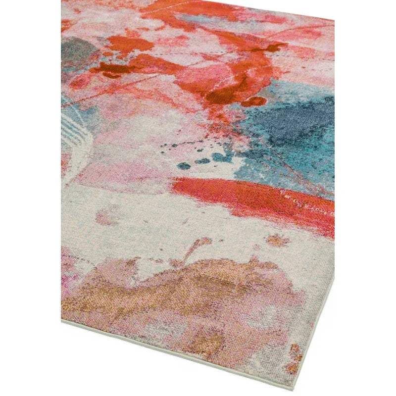 Modern abstract area rug with pink, orange, blue and gold watercolor pattern