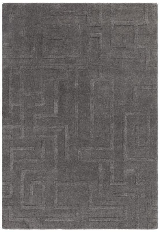Grey geometric pattern area rug with subtle raised maze design