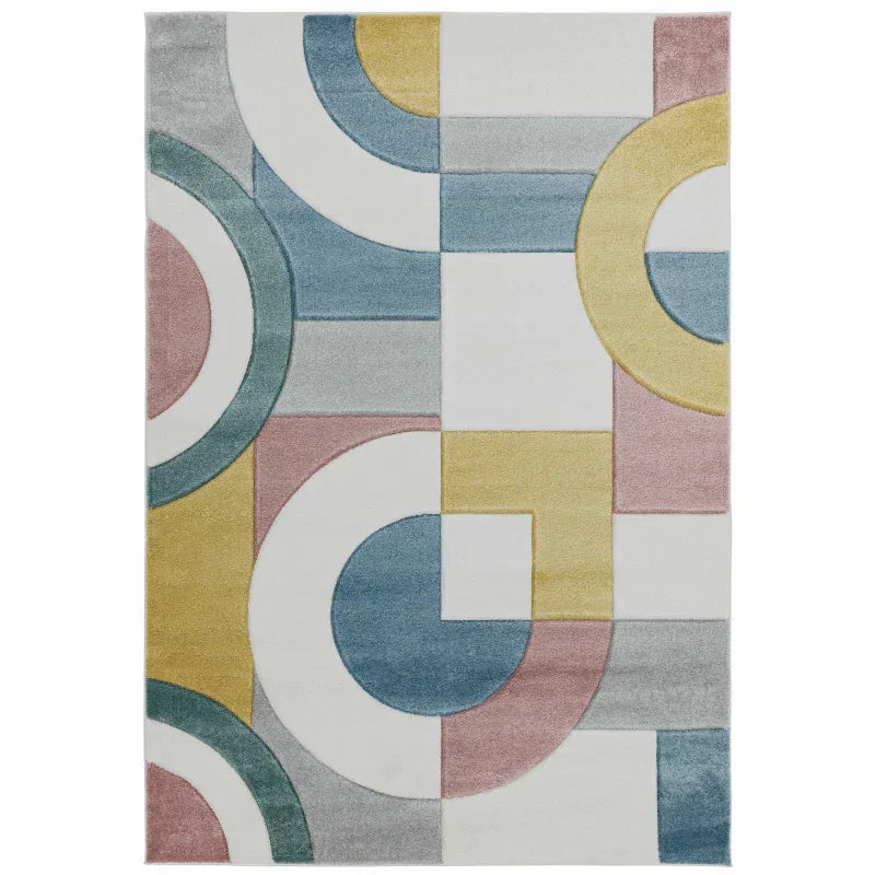 Geometric area rug with pastel yellow, blue, pink, and grey blocks and curves pattern