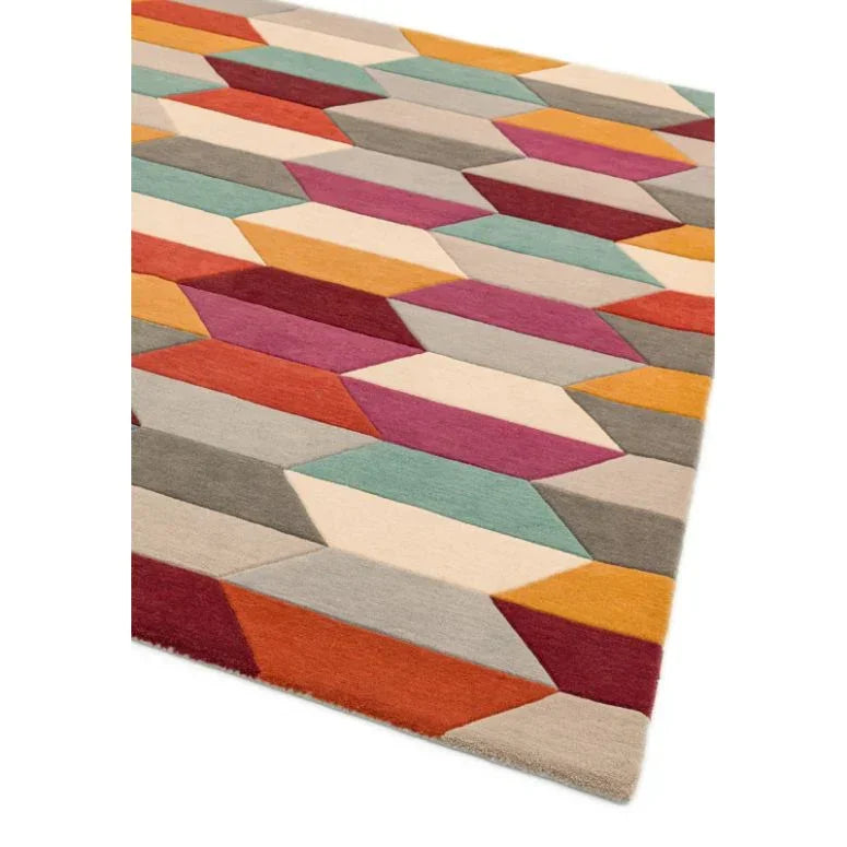 Geometric wool rug with multicolour blocks including orange, teal, magenta and beige