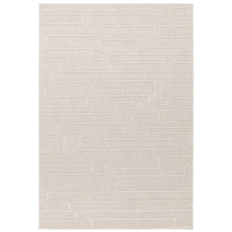 Beige textured rug with geometric pattern and subtle raised lines, top view